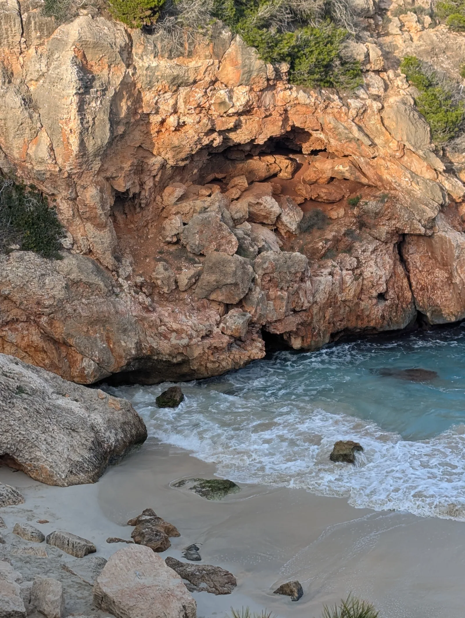 Secluded cove on Mallorca, limestone cliffs and turquoise water